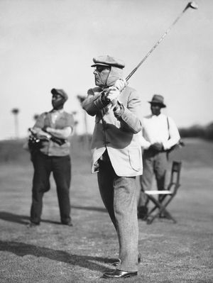 Ormond Beach, Florida: c. 1932
Oil man and philanthropist John D. Rockefeller as he plays golf on his private golf course at the Casements.