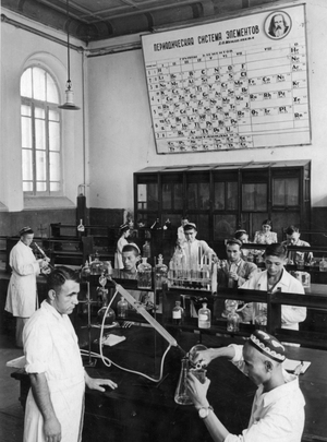 Department head S.T. Talipov (left) in the analytical chemistry laboratory of the Central Asian University in Tashkent, Uzbekistan. 1947.