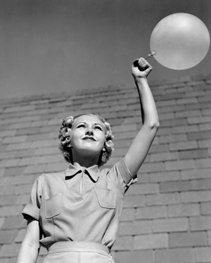 Los Angeles, California: c. 1931
Actress Evelyn Knapp introduces the novel idea of exercises with a balloon on an elastic string