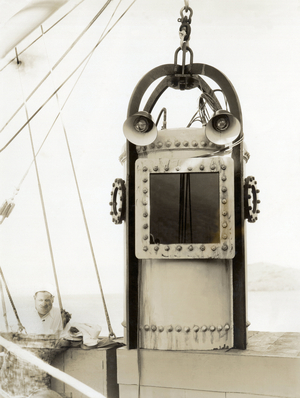 United States: c. 1928
A deep sea diving bell on a ship.