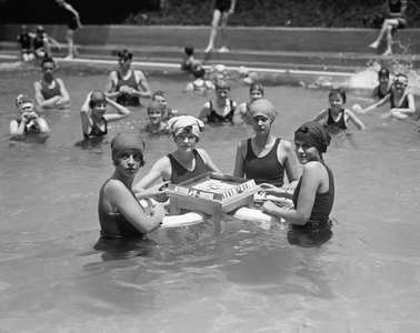 Washington, D.C.: June 20, 1924
Four young women playing Mah-Jong on a floating table in a swimming pool.