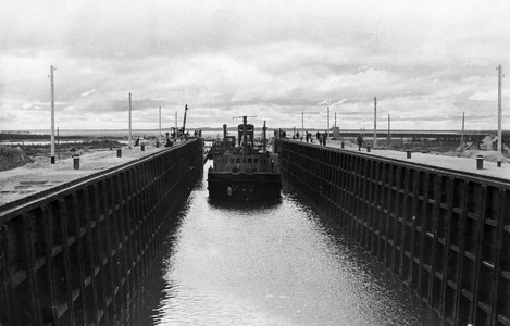 A ship entering lock #3 of the Stalin White Sea - Baltic Canal (Belomarkanal). August 1946.