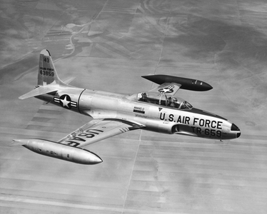 United States: c. 1948
A Lockheed T-33 jet trainer aircraft. It is a tandem cockpit version of the Lockheed P-80 Shooting Star used by the Army Air Force.