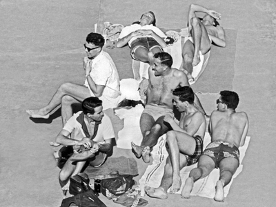 San Francisco, California: c. 1953.
A group of young men sunbathing in San Francisco.