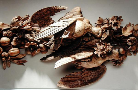 Detail of dead birds and fruit (carved wood)