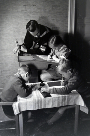 Members of an extended family helping one another, Germany 1930s