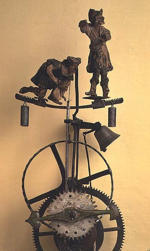 Jailer's Clock with wooden hour hand only, embellished with 17th century clay figures, Austrian, 15th century