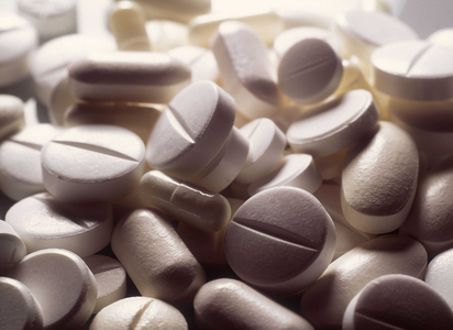 Still life of medicaments: different pills and capsules.