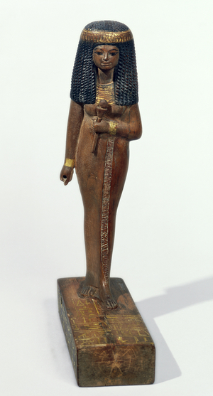 Statue of the Lady Nay, New Kingdom (pinewood with gold veneer)