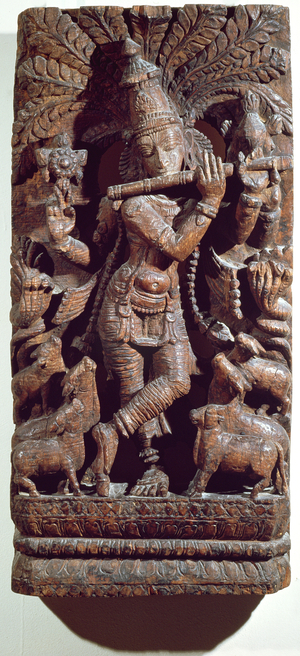 Krishna playing a flute (wood)