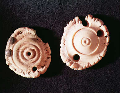 Two amulets, 1st century bc (bone)