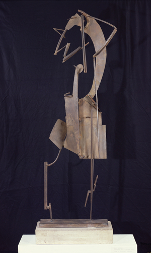 Woman Arranging her Hair, 1929-30 (metal)