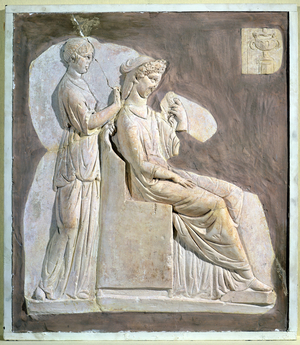 Relief depicting a woman at her toilet, from Tunisia (stucco)