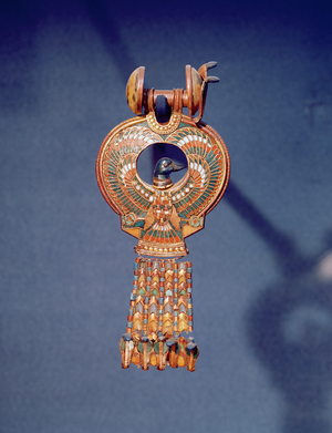 Left earring from a pair earrings with a bluebird, from the tomb of Tutankhamum, Valley of the Kings, Thebes, c.1347-37 BC (gold and molten glass)