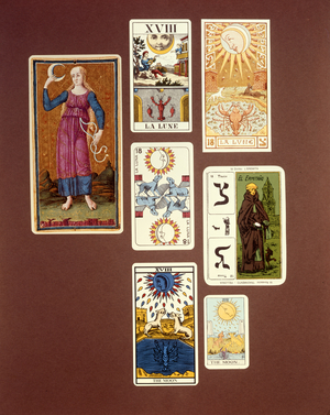XVIII The Moon, seven tarot cards from different packs