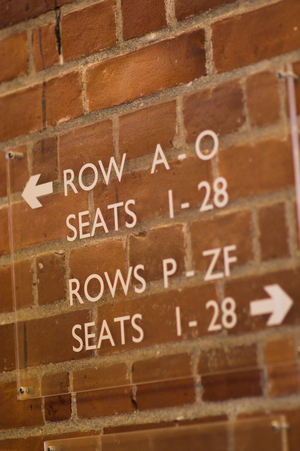 Sign Reading seat and row numbers at Snape Maltings Concert Hall
