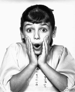 Portrait of a girl looking surprised