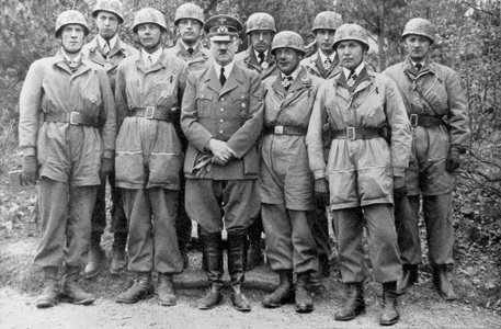 Hitler with some of the airborne troops who captured the stronghold of Eben Emael in Belgium on 10 May 1940 (b/w photo)