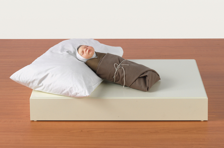 Swaddled Baby, 2002 (polyester resin, hair, acrylic, fabric, base)