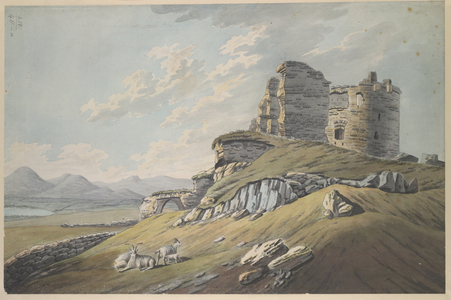 Sheep on a rocky hill in the foreground; the ruins of Dundrum Castle on the right; fields and a body of water in the middle ground; mountains in the distance
