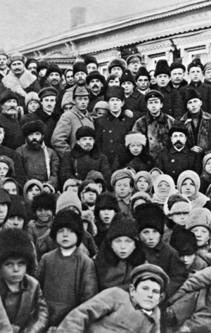 Vladimir Ilyich Lenin and Krupskaya among peasants, 1922 (b/w photo)
