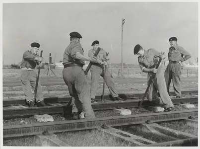 Members of the Royal Pioneer Corps undertaking railway maintenance, 1960 circa (b/w photo)