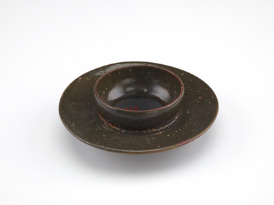 Tea bowl stand, first half of 12th century (stoneware with black slip under celadon glaze)