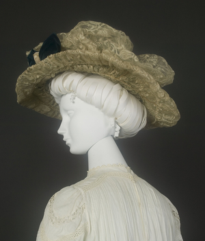 Wedding dress, 1911 (partial view of shoulders and hat), Cotton batiste, lace, Marshall Field & Co., Chicago