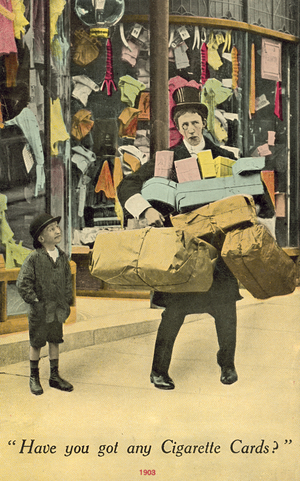 Man outside shop, carrying lots of parcels (colour photo)