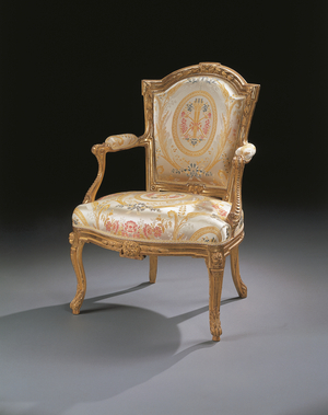 Suite of four transitional period armchairs (gilded beech)