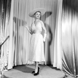 Fashion By Pierre Balmain For Spring-Summer 1953, February 18, 1953, Paris : Wide-Brimmed Hat, Dress and Gloves (b/w photo)