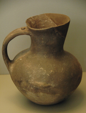 Prehistoric Art. Early Bronze Age. Handmade Jar of clay without decoration. Globular body, wide mouth and a handle.