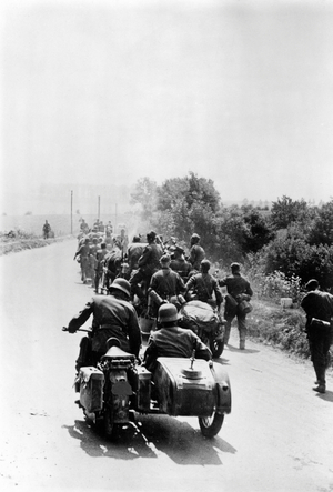 German troops marching in France, 1940 (b/w photo)