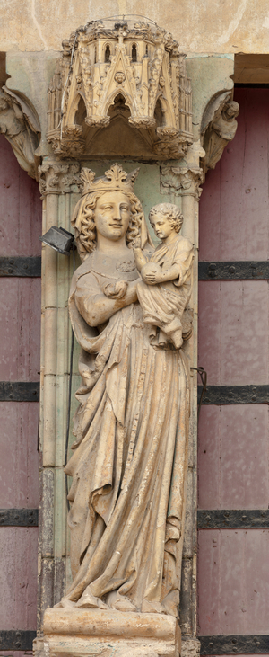 Cathedral (Cathédrale Notre-Dame). Exterior. South portal. The trumeau. Statue of Madonna with child (photo)