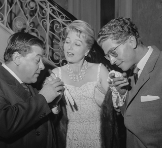 Francis Blanche, Simone Renant and Darry Cowl durin cocktail for premiere of film "La francaise et l'amour", Paris, September 16, 1960 (b/w photo)