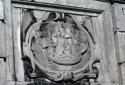 Stone carving of 15th Century sailing ship on wall of Alfama district, Lisbon, Portugal (photo)