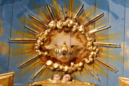 Saint-Nicolas de Veroce baroque church. Representation of the Holy Spirit. France.