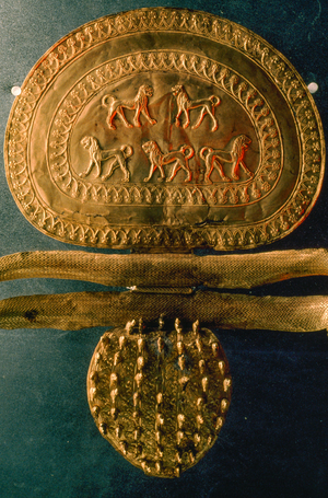 Lions parade across the catch plate of a fibula or clasp., 1980s (photo)