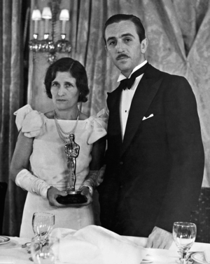 Walt Disney with his wife, Lillian Bounds after the Oscars prize-giving, 1932 (b/w photo)