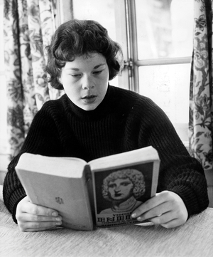 Princess Maria Beatrice of Savoy , Daughter of King Umbertoii of Italy, during Winter Sports Holidays Reading "Eneid" Byvirgile January 03, 1957 (b/w photo)