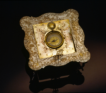 A traveler used this instrument that combined compass with a sundial., 1990 (photo)