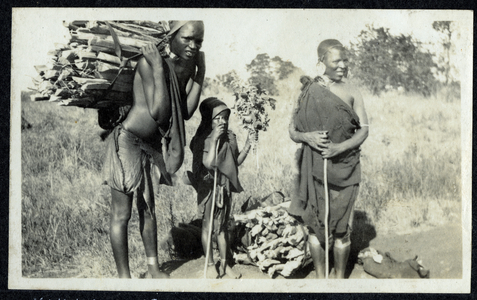 Kikuyu women with firewood, n.d. (b/w photo)