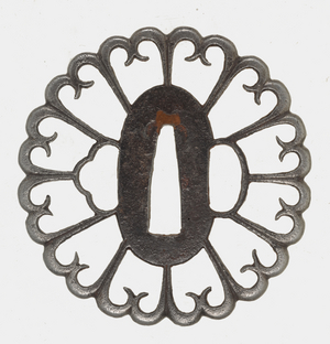 Tsuba: Openwork Chrysanthemum, 18th
century (Iron)