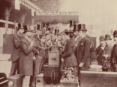 Listening to the phonograph (b/w photo)