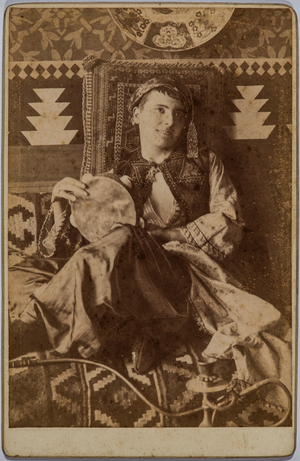 European tourist posing with oriental dresses and decorations, Alexandria, Egypt, 1860-90, 1860-90 (photo)