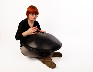 Caisa Drum, or Hang Drum, in playing position.