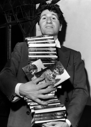 Singer Mouloudji Signing his Book "Enrico" May 25, 1955 (b/w photo)