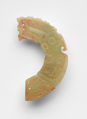 Finial in the form of a bird, probably reworked from a disk (bi 璧), c.1300-c.1050 BC (jade, nephrite)