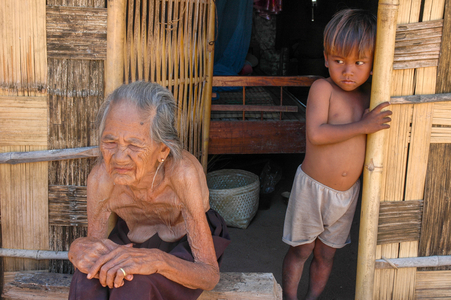 Cham culture: Old Cham woman with young Cham boy, village near Phan Rang, Vietnam.