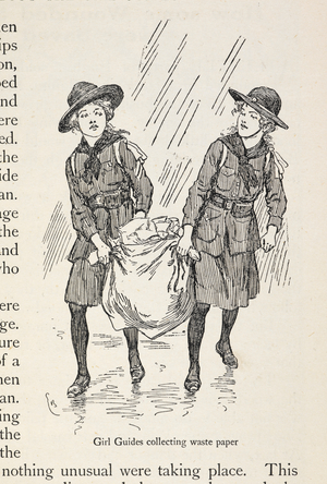 'Girl guides collecting waste paper'. Girl guides helping the war effort.